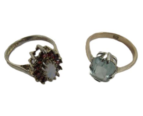 A Ladies silver gilt Ring Set, with central oval opal stone, surrounded by a ruby coloured garnet cluster, size M 1/2; togeth