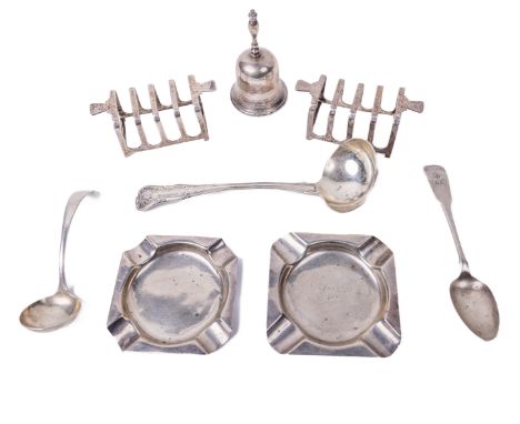A pair of English silver Art Deco miniature Toast Racks, by Mappin &amp; Webb, a silver Calling Bell, two silver Ashtrays, a 