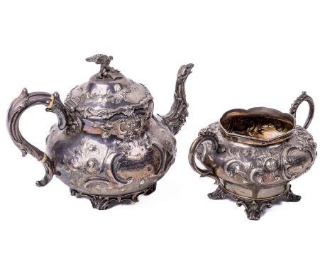 Co. Cork: A fine quality English silver two part Tea Service, embossed design comprising teapot and sugar, by R. &amp; H. (Ha