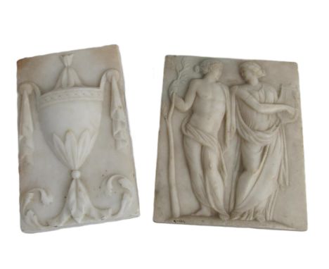 An early carved marble fireplace Panel, depicting classical male and female figures in conversation, approx. 18cms x 14cms (7
