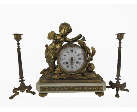 A 19th Century ormolu French Mantle Clock, by Mannheim, Paris, the circular dial with Roman and Arabic numerals and pierced d