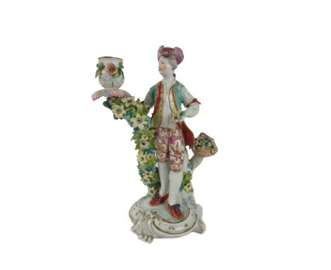 A very good 18th Century flower encrusted Derby Figural Candlestick, 25cms high. (1)&nbsp;Provenance:&nbsp;The McDowell-Mahon