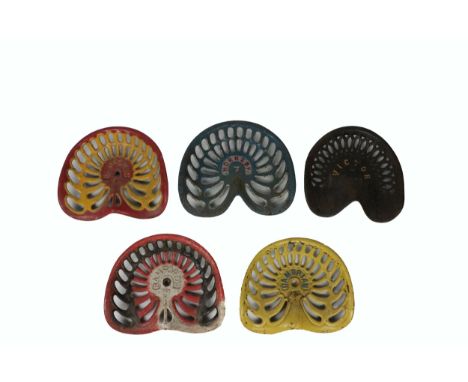 Tractor Machine Seats. Gambrian 148, painted yellow' Bamford - painted yellow and red; Hornsby - painted blue and silver; Cam