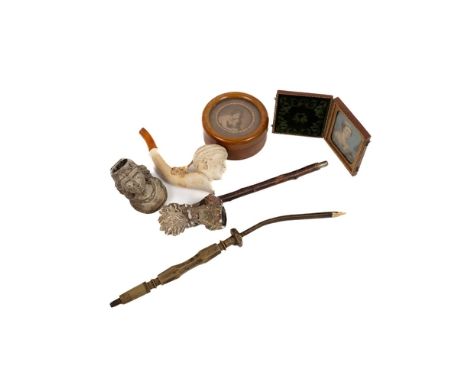 A 19th Century Meerschaum&nbsp;Pipe, of plain colour depicting lady wearing turban with amber mouth piece; together with an e