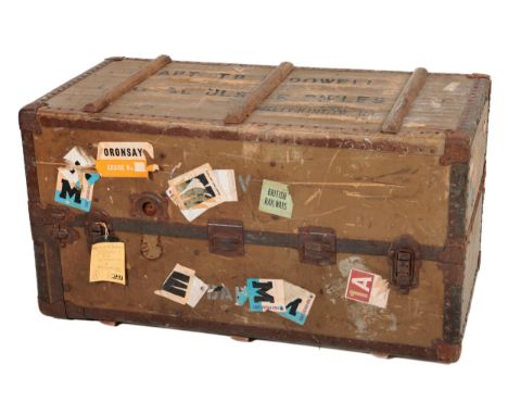 A large Victorian leather and brass bound Steamer Trunk, with owners name on top 'Captain T.B. MCDowell, Royal Ulster Rifles 