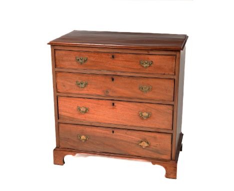 A Georgian mahogany Chest,&nbsp;of four long drawers, the plain moulded top over graduating drawers with ornate brass handles