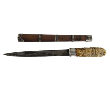 Militaria: A rare 19th Century Burmese Ceremonial&nbsp;Dagger, the hilt depicting a carved bone model of a standing dragon, t