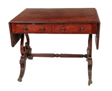 A fine quality 19th Century mahogany drop-leaf Sofa Table, in the manner of Duncan Phyffe (1770-1854), the plain top with dro