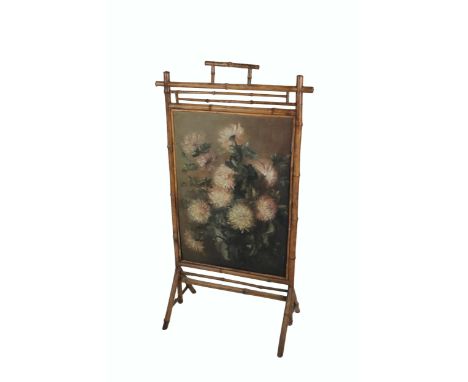 A Victorian bamboo framed Firescreen, with inset floral painting, O.O.C.,&nbsp;signed&nbsp; E. Rice 1894. (1)  Provenance: Th
