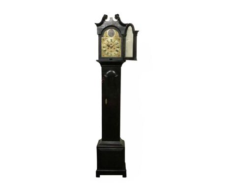 An important early 18th Century Irish mahogany cased Grandfather Clock, of narrow proportions, the hood with broken arched pe