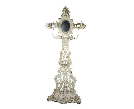 A Victorian Coalbrookdale type cast iron Hat and Coat Stand, with oval mirror back on a pierced decorated upright, approx. 20