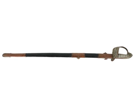 Militaria: A late 19th Century Naval Sword, probably by James Cracknell, Portsea (makers marks worn) the blade (remnants of e