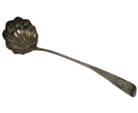 A rare Irish Provincial Soup Ladle, by William Reynolds, Cork (1757-80), decorated with flowers and shells and crested with s