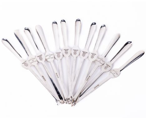 A rare set of 12 silver crested Lobster Forks, Sheffield by George Howson, each fork with crowned lions head and engraved on 