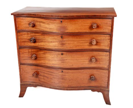 A fine quality 19th Century mahogany serpentine shaped Chest, of four long graduating drawers with turned handles on outsplay