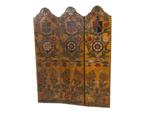 A Triptych composed of leather over wooden boards. Each panel is decorated with:  *&nbsp;National Emblems: shamrocks for Irel