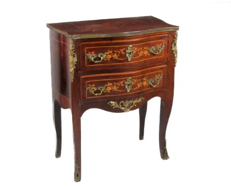 A French Louis XVI style bombe shaped Commode, of small proportions with floral marquetry top brass banding, over two long dr