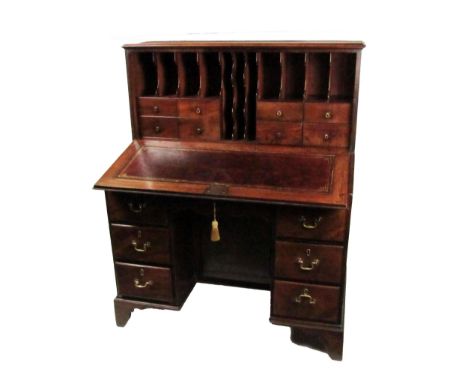 A rare and important Irish Georgian mahogany Estate Desk, in the manner of Chippendale, the upright section with moulded top,