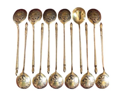 A set of 12 fine Russian Imperial Niello work and silver gilt Caviar Spoons, makers mark B.C. 84, 1879, each with tapering&nb