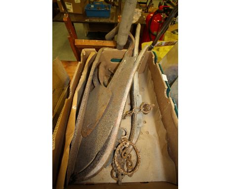 Box of vintage farm equipment