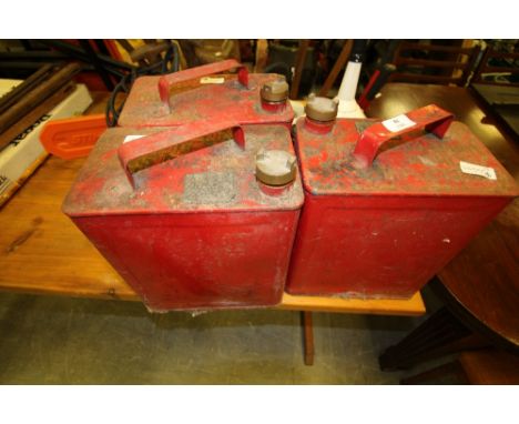 3 vintage red metal fuel cans, funnel and a plastic fuel can