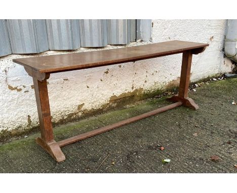 An oak console table on splayed feet  (H75cm W198cm D45cm)