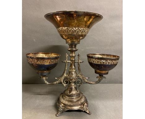 A Silver plate Epergne or centrepiece embossed design on north wind feet from The Bombay Company 43cm H