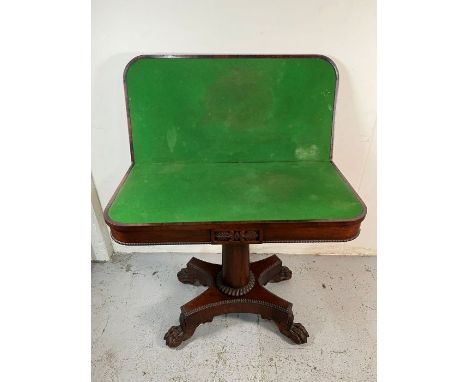 A regency style pedestal card table with iron paw feet (H75cm W91cm D45cm)