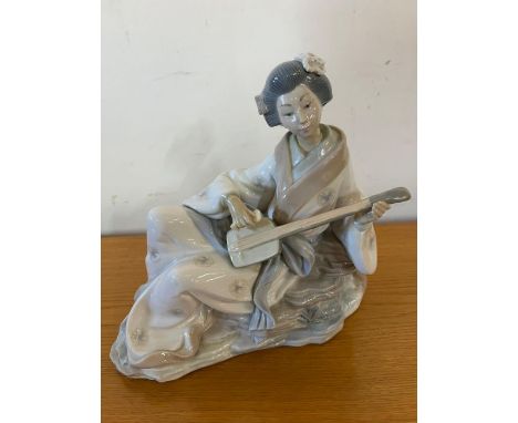 A Geisha playing a Shamisen by Nao 