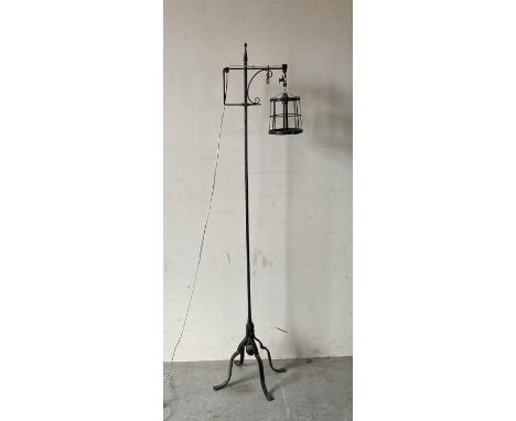 A wrought iron Mid Century floor lamp, gibbet style shade (H152cm)