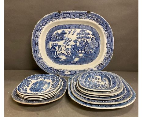 A selection of blue and white meat and serving platters to include Wedgewood and Willow 