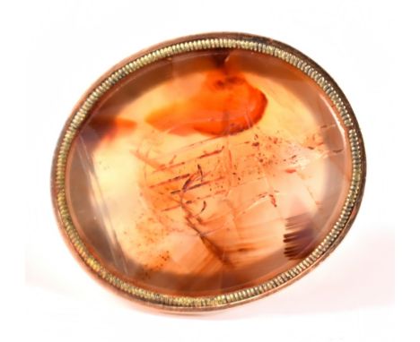 A Georgian yellow metal seal, the agate panel carved with an owl perched on a lyre, diameter approx 3cm, approx 6.9g.&nbsp;Ad