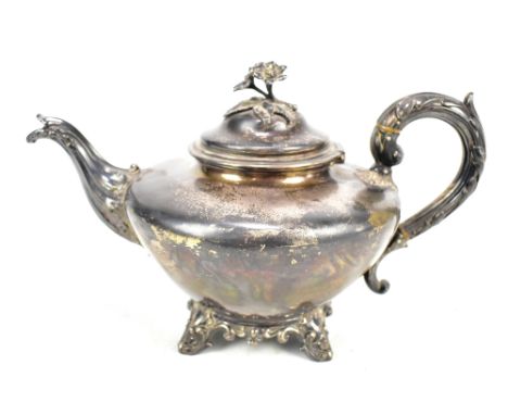 CHARLES REILY &amp; GEORGE STORER; a Victorian hallmarked silver teapot, the finial with applied floral mount, London 1841, a