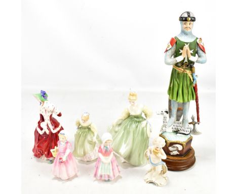 ROYAL DOULTON; five figures including HN1992 'Christmas Morn' and HN2193 'Fair Lady' (two seconds), a Goebel cherubic figure 