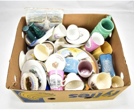 A large quantity of decorative ceramics relating to various exhibitions and expositions, including a Royal Doulton beaker for