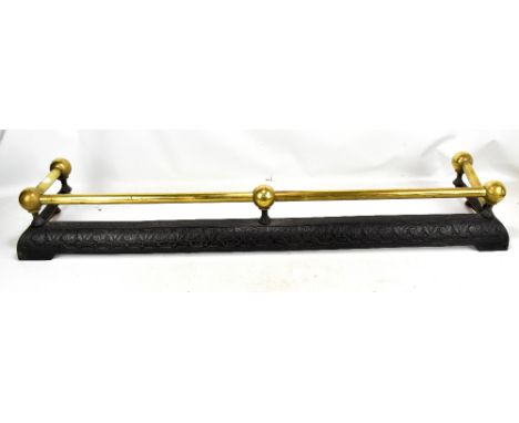 A 19th century brass and cast iron foliate motif fender, width approx 120cm (af).Additional InformationThe right hand section