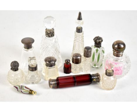 A Victorian hobnail cut perfume bottle with Burmese type glass panel depicting a bird's nest and foliage with Victorian hallm