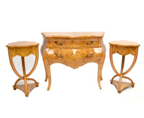 A reproduction bird's eye maple veneered two drawer bombé commode raised on square section cabriole legs, width 103cm, and a 