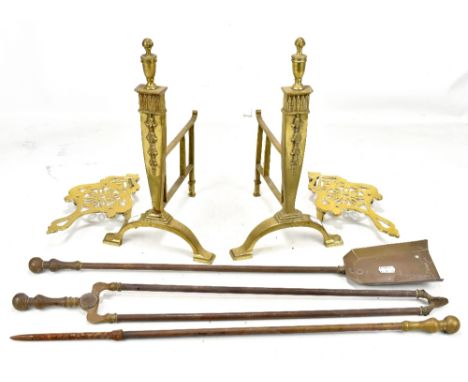 A pair of neo-Classical brass andirons, a set of three companion tools and two brass trivets (7).