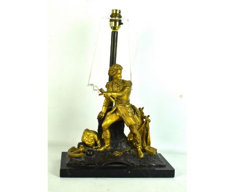 A late 19th century French bronzed and gilt metal figural table lamp raised on rectangular marble plinth, length 28cm.Additio