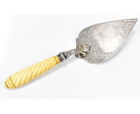 HILLIARD &amp; THOMASON; a hallmarked silver trowel with chased floral decoration and turned ivory handle, Birmingham 1918, l