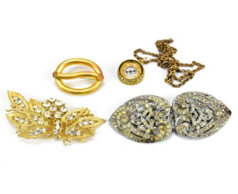 Four items of costume jewellery comprising three brooches, and a compass on a gold plated chain (4).