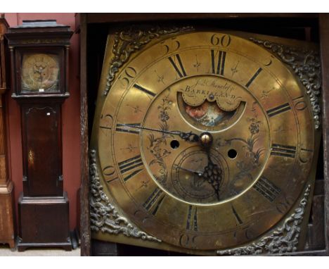 JOSHUA STANCLIFFE OF BARKISLAND; a George III oak longcase clock, the caddy top above brass dial set with Roman numerals and 