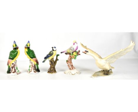 MEISSEN; a porcelain figure of a blue tit, painted marks to base, no.1123, height 13.5cm, a Goebel figure of a swan and three