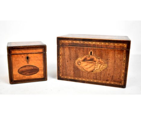 A Georgian inlaid mahogany tea caddy of rectangular form, the hinged cover enclosing two compartments, length 22cm, together 