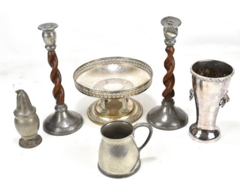 A small group of metalware including a pair of pewter mounted candlesticks, a trumpet vase, a mug, etc, with hand beaten fini