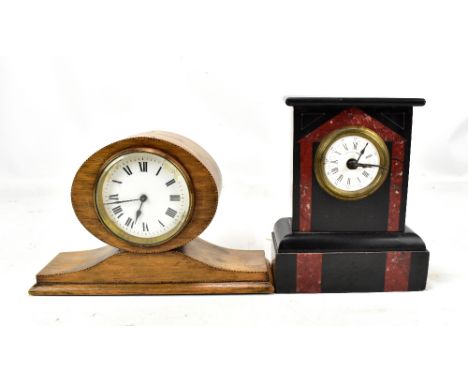 An Edwardian inlaid oak balloon mantel clock, height 16cm, also a slate and marble mantel clock, height 19.5cm (part af) (2).
