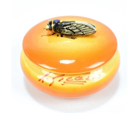 An early 20th century French ceramic lidded trinket pot, the cover decorated in relief with a dragonfly, the body signed, pos