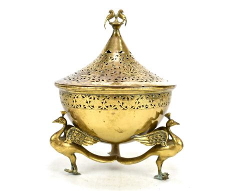 A South East Asian pierced brass potpourri bowl, the lid finial featuring two birds and with pierced foliate scroll detail ra