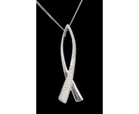 An 18ct white gold and diamond set pendant suspended on 18ct white gold fine link chain, length of pendant 5.5cm, approx 8.6g